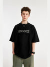 "DANGEROUS" Puffer Print T-Shirt in Black Color 3