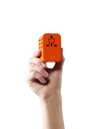 Matador Global Travel Adapter in Forget Me Not Orange Color