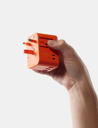 Matador Global Travel Adapter in Forget Me Not Orange Color