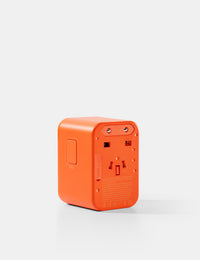 Matador Global Travel Adapter in Forget Me Not Orange Color