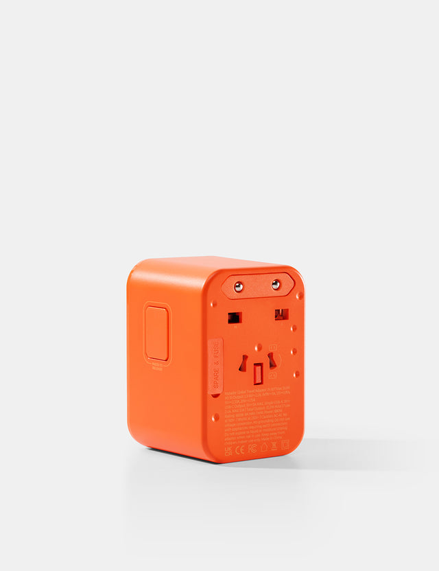 Matador Global Travel Adapter in Forget Me Not Orange Color